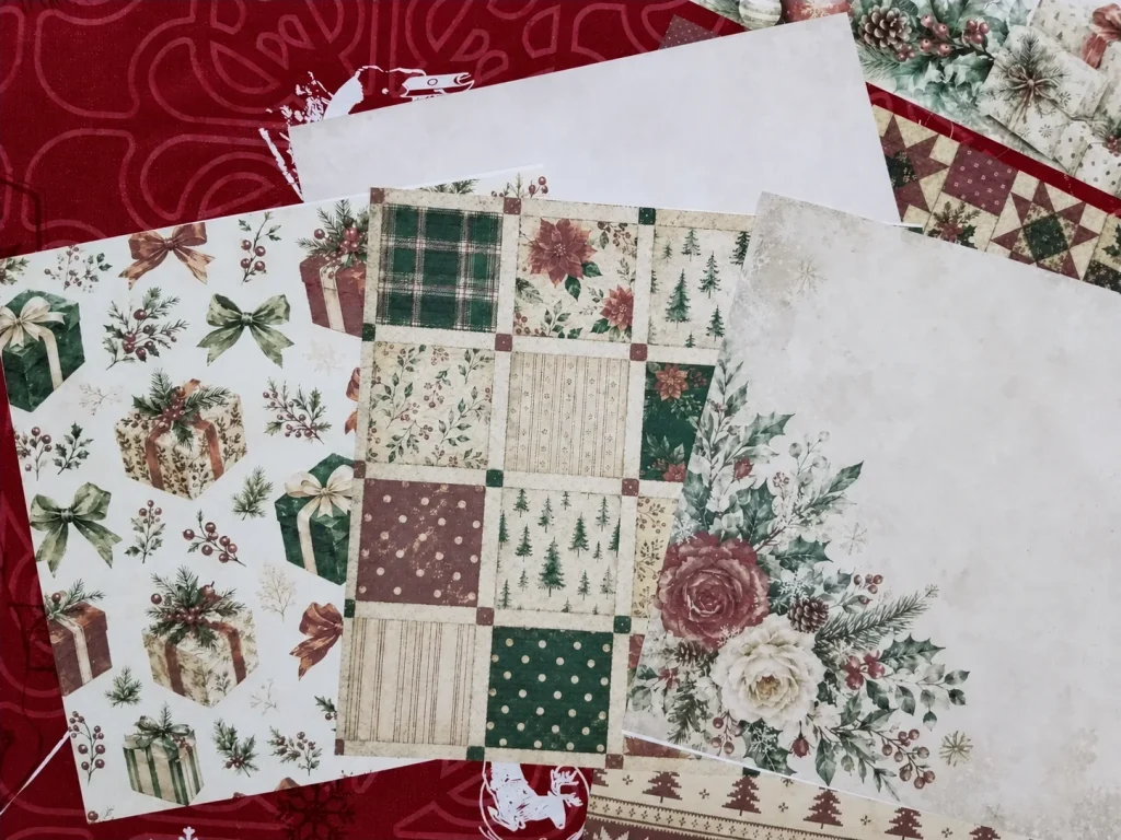 Printed vintage Christmas papers with gifts, quilt blocks, trees and winter florals