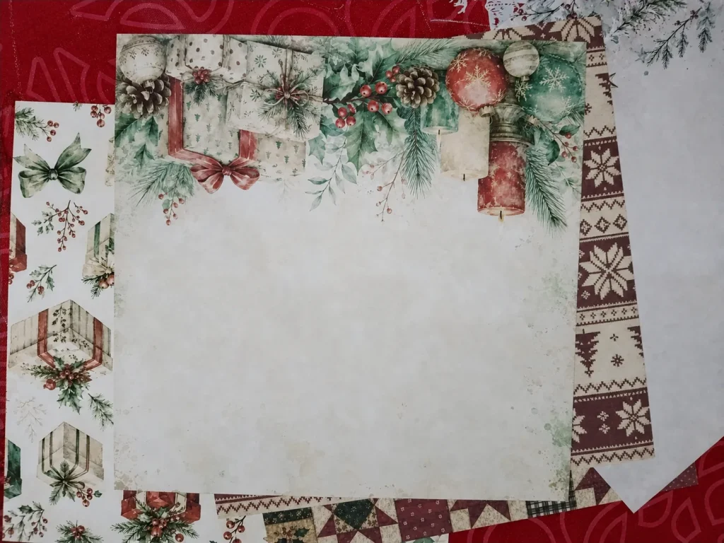 Printed Christmas journal page with gifts, ornaments, pine branches and open writing space