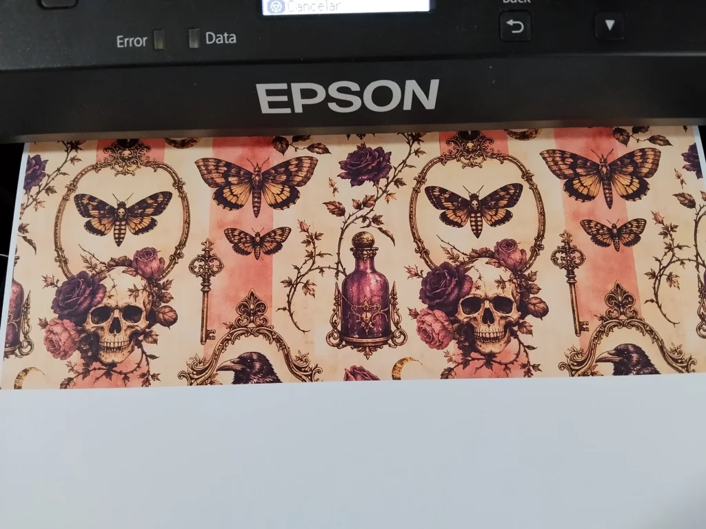 Gothic botanical scrapbook paper with moths, skulls and roses emerging from an Epson home printer